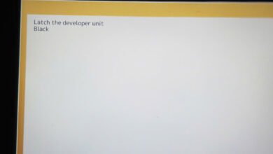 Toshiba báo lỗi Latch the developer unit Black